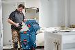 Bosch PRO Combo Kit 18V-Set mit 3 Werkzeugen: GSR + GBH + GWS + 2x GBA 5.0 Ah + GAL 18V-40 Produktbild img11 S